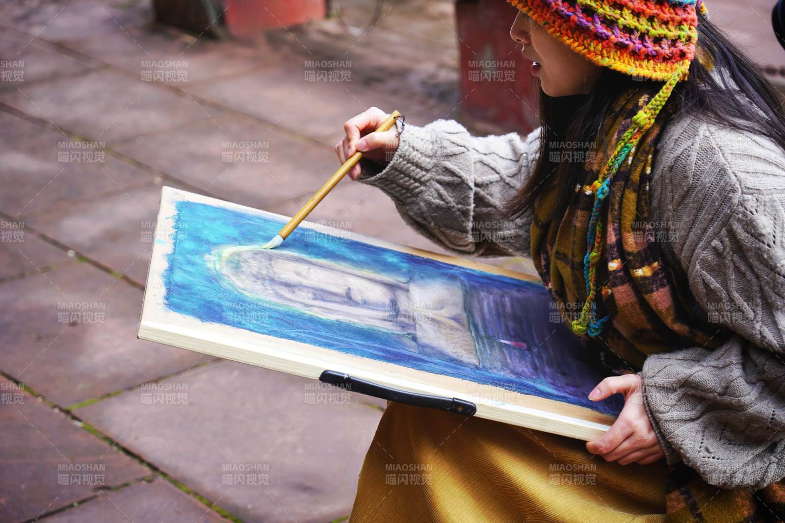 街頭畫家創(chuàng)作中