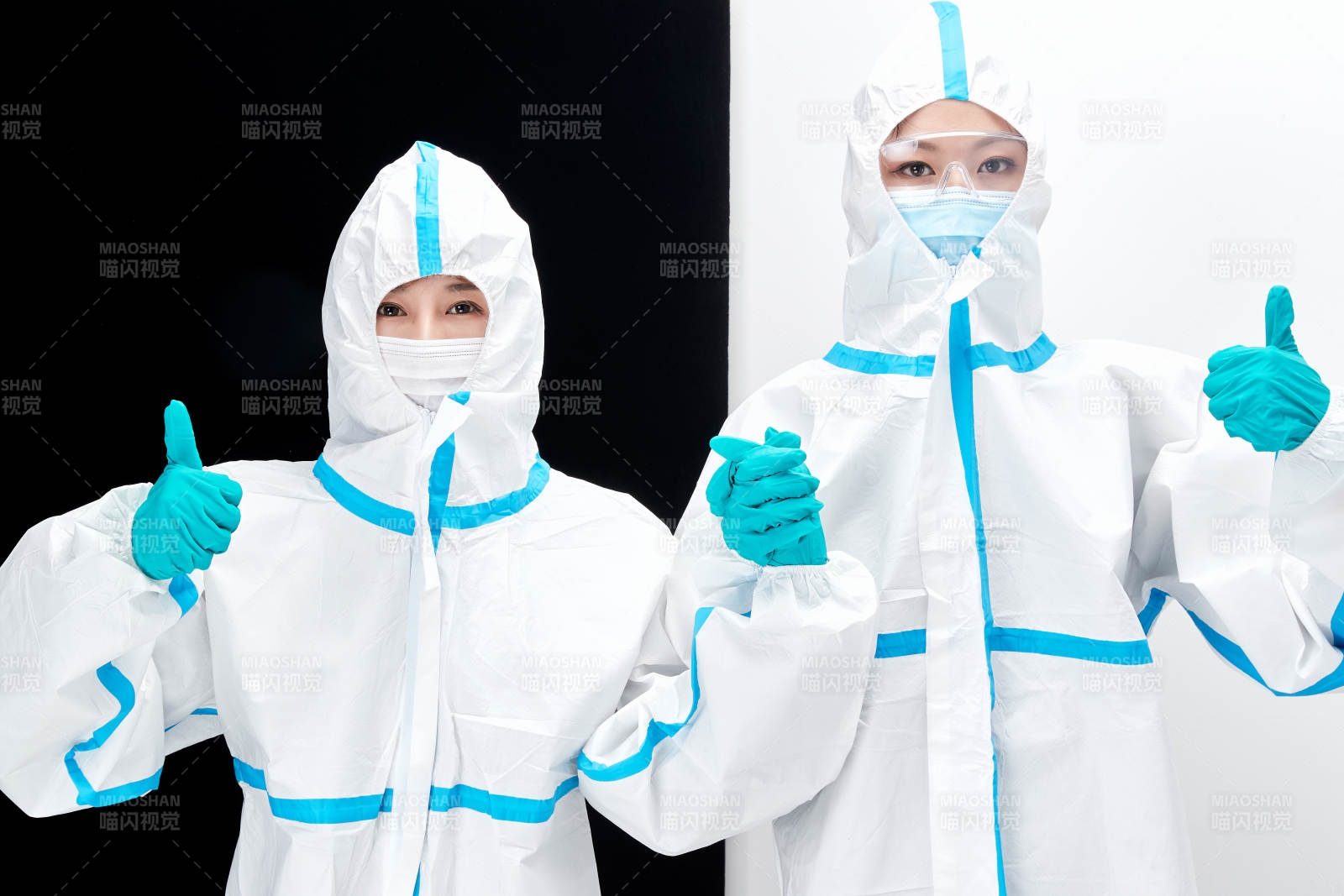 穿白色防護(hù)服佩戴護(hù)目鏡口罩的防疫人員