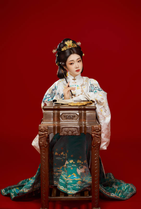 红色背景下穿着中国明朝明制汉服服饰的少女