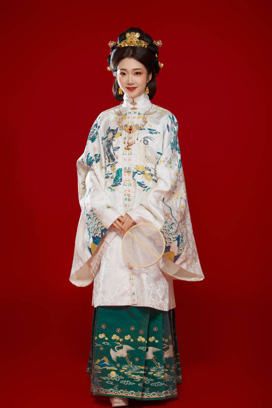 红色背景下穿着中国明朝明制汉服服饰的少女