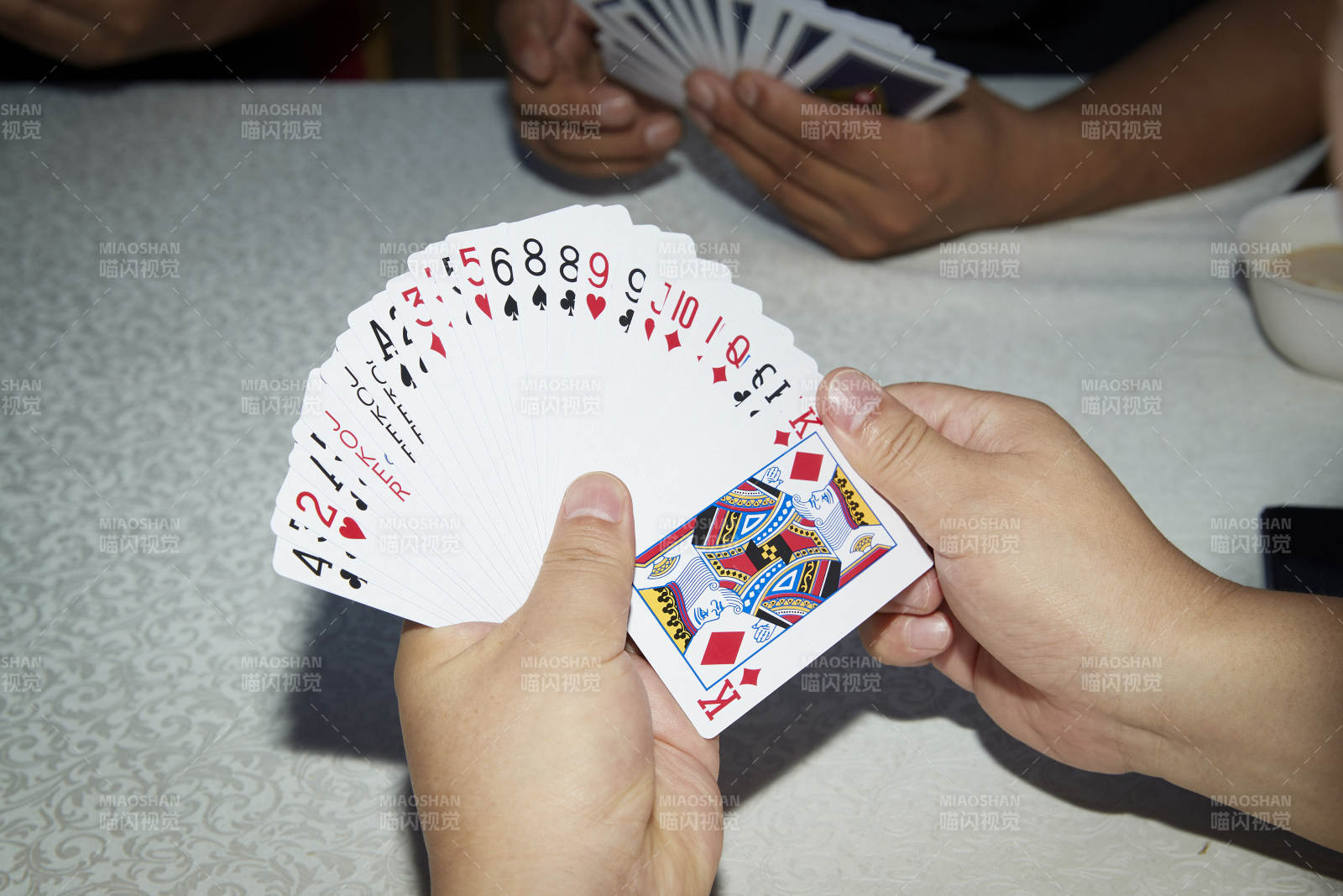 掼蛋扑克比赛现场