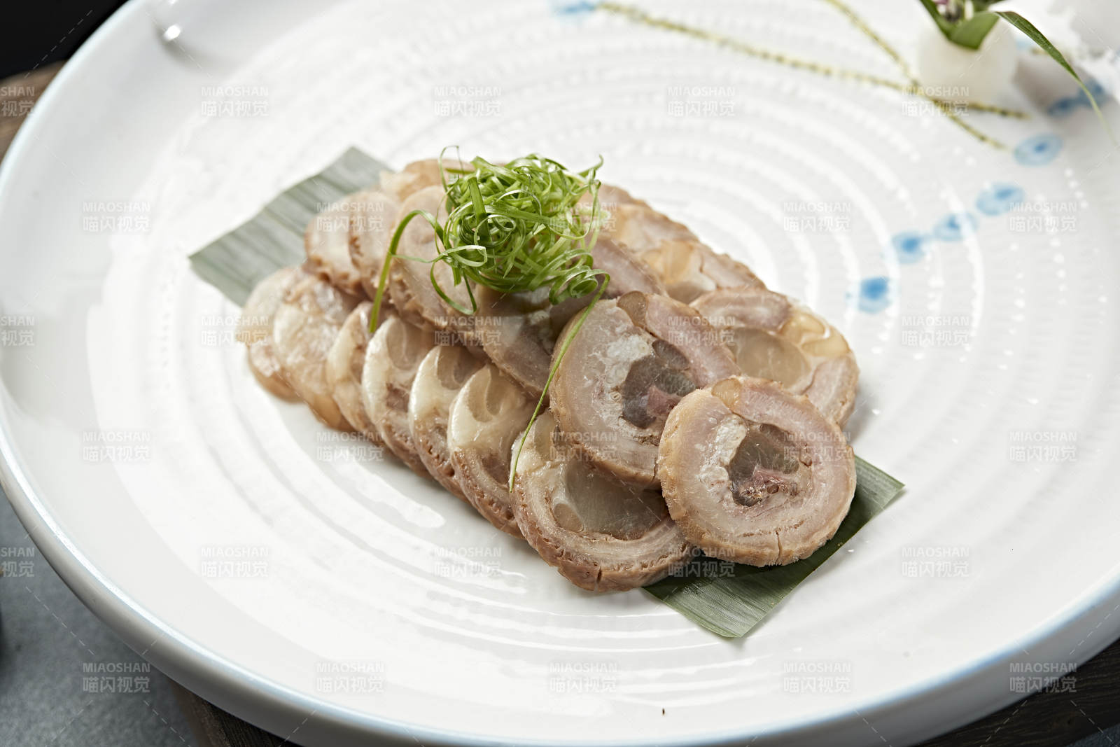 牛肚卷牛蹄筋切片-摄影图