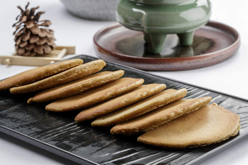 黑色石盘装的家常滩簧图片