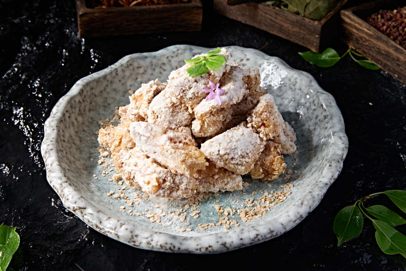 中餐美食糖霜麦片焗红薯块