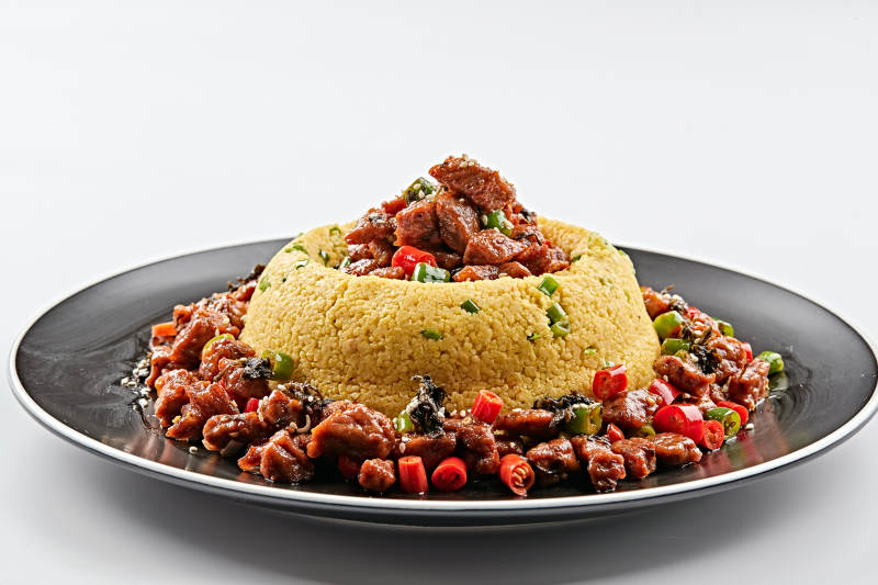 黑色磁盤裝的金米辣味飄香牛仔粒