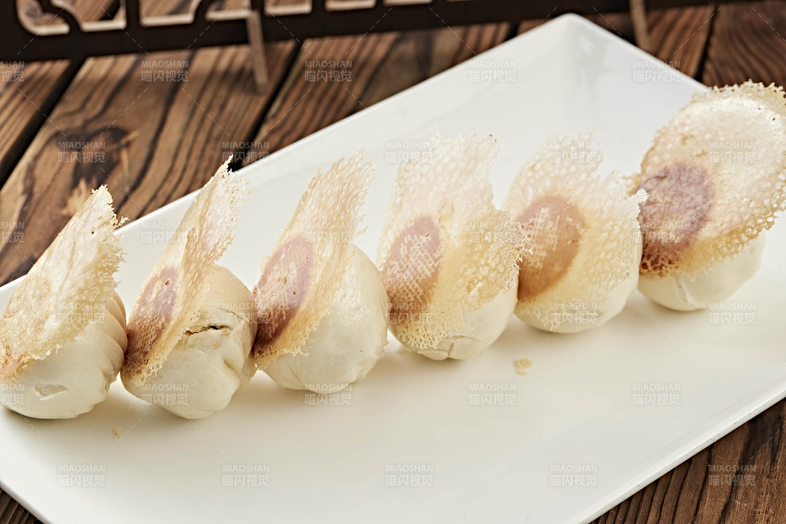 雪花渔网水煎包