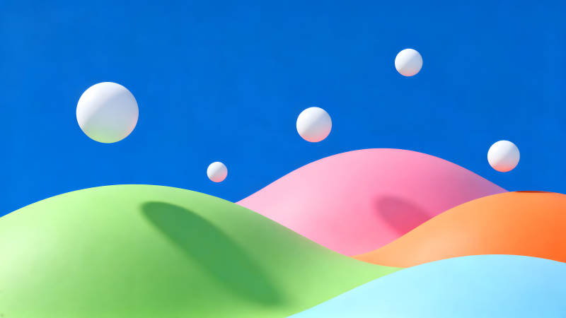 彩色山丘与白色球体构成超现实场景-图片