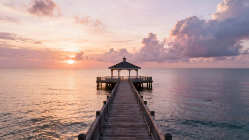 海邊木棧道亭子夕陽-圖片