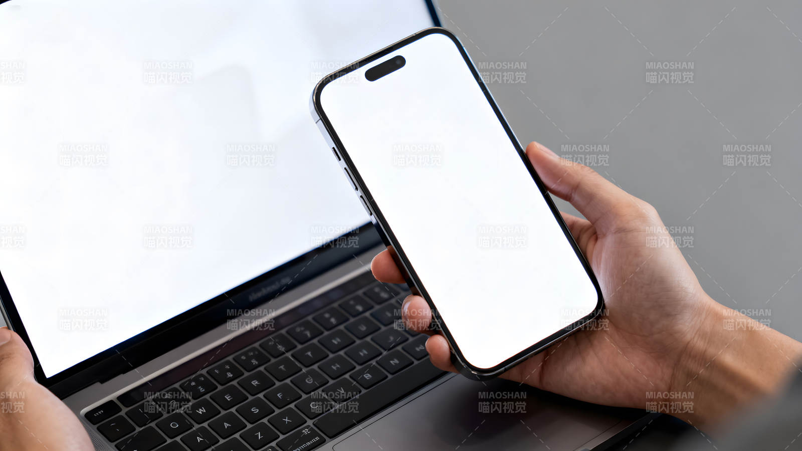 手机和笔记本电脑的特写镜头-图片