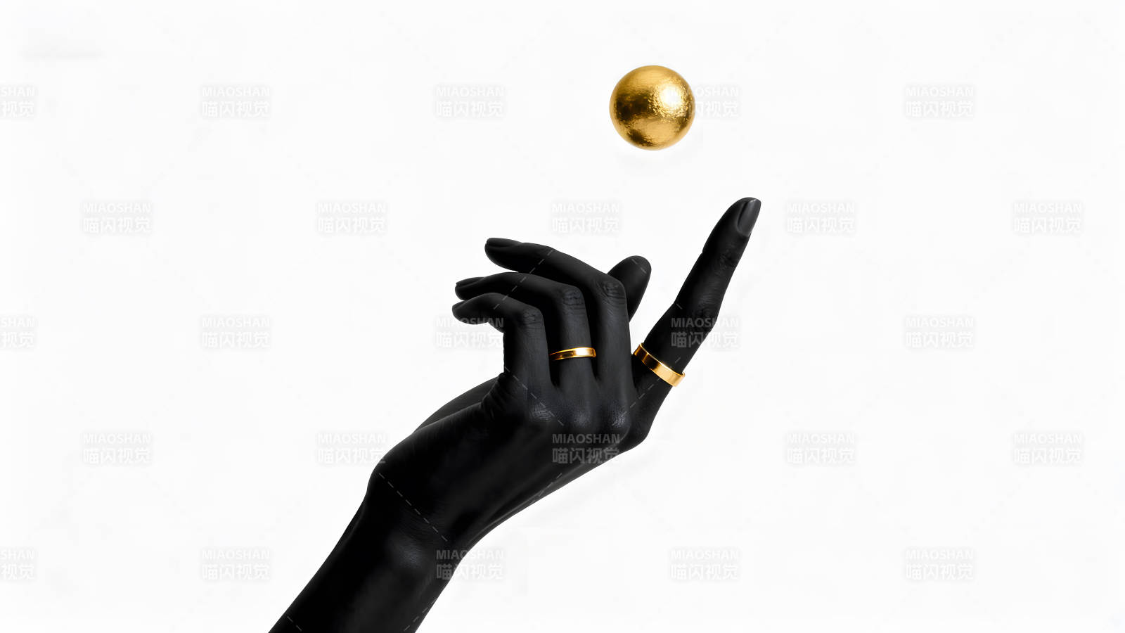 黑色手臂托舉金色圓球圖片