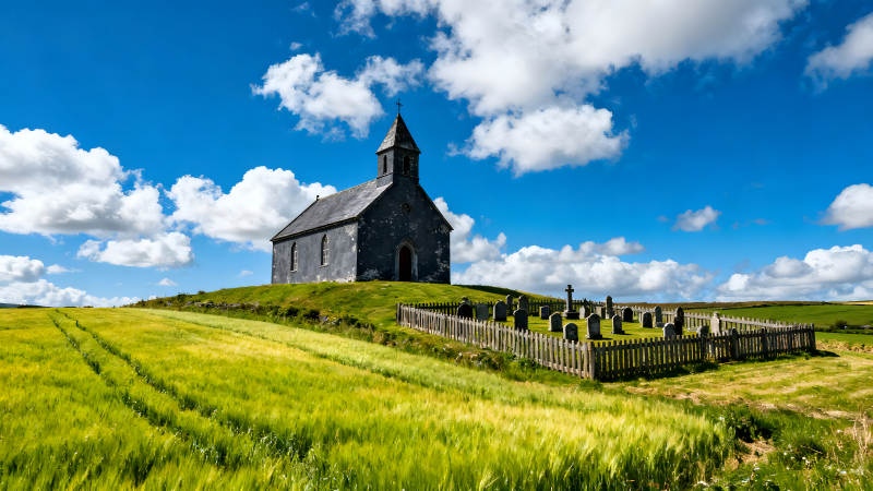 教堂墓地藍天白云綠草地-圖片