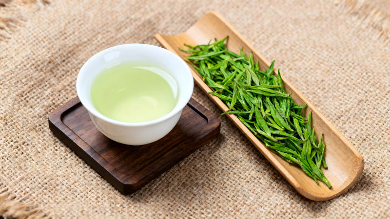 茶水與茶葉的特寫照片-圖片