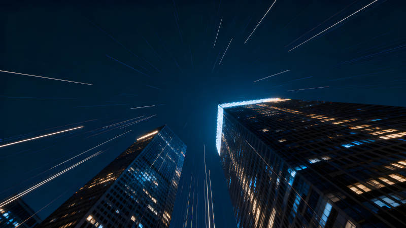 夜幕下的摩天大樓與星光-圖片