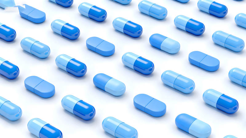 蓝色药丸组成的图案-图片
