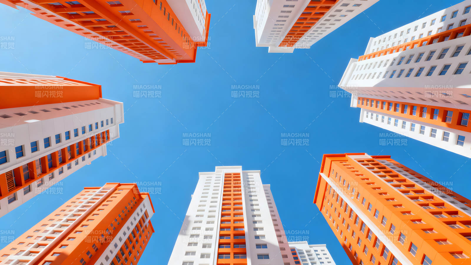 仰視建筑群橙白相間高樓與藍天-圖片