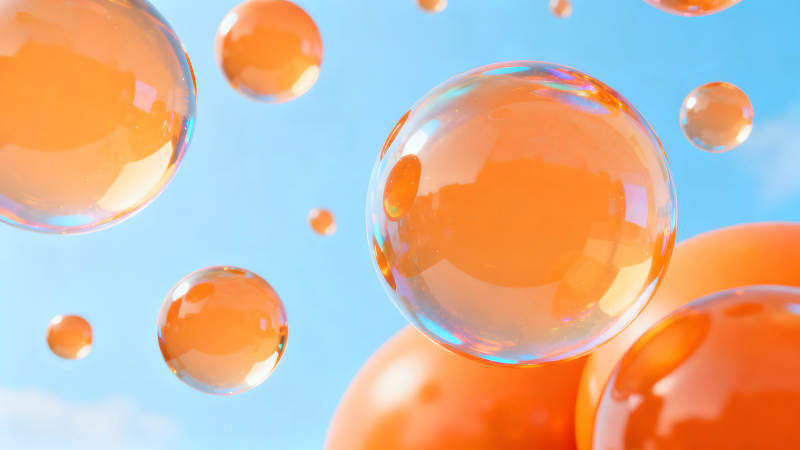 悬浮橙色气泡特写图片