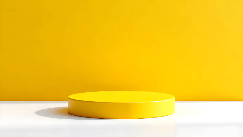 黄色背景下黄色圆柱展示台-图片