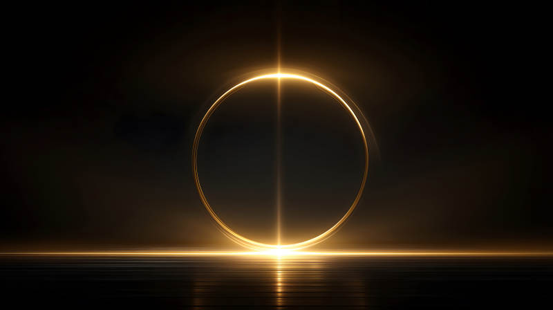 金色光環在黑色背景上發光-圖片