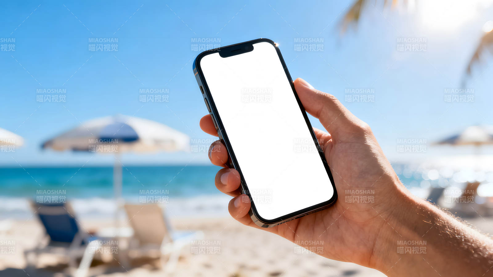 海灘上的手機顯示屏-圖片