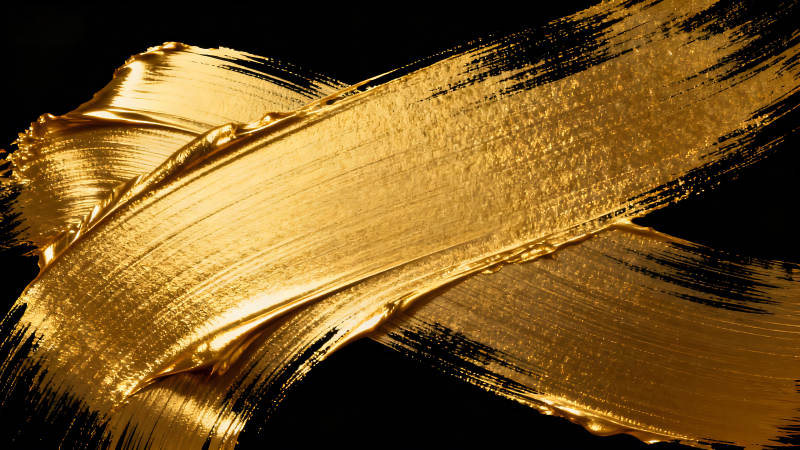 金色筆刷在黑色背景上的抽象藝術-圖片