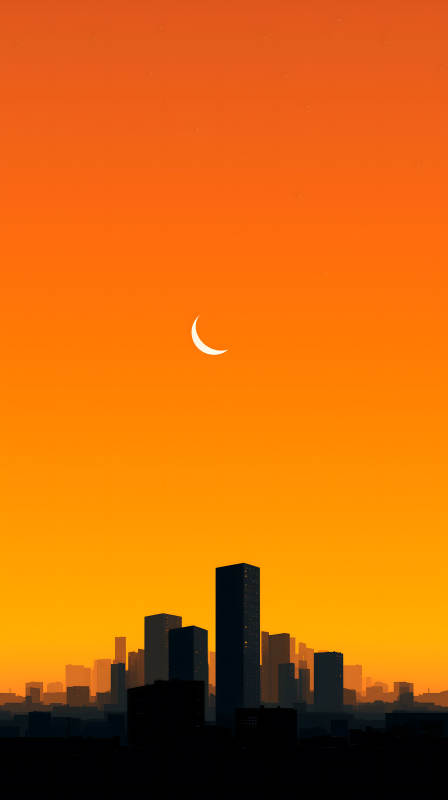 橙色天际下的城市剪影图片