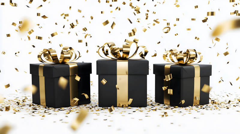 金色礼盒和彩带图片