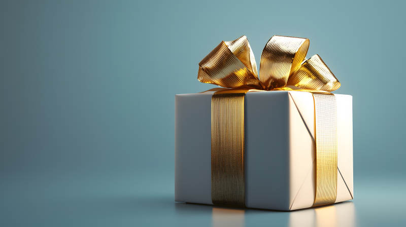 金色绸带的纯白礼物图片