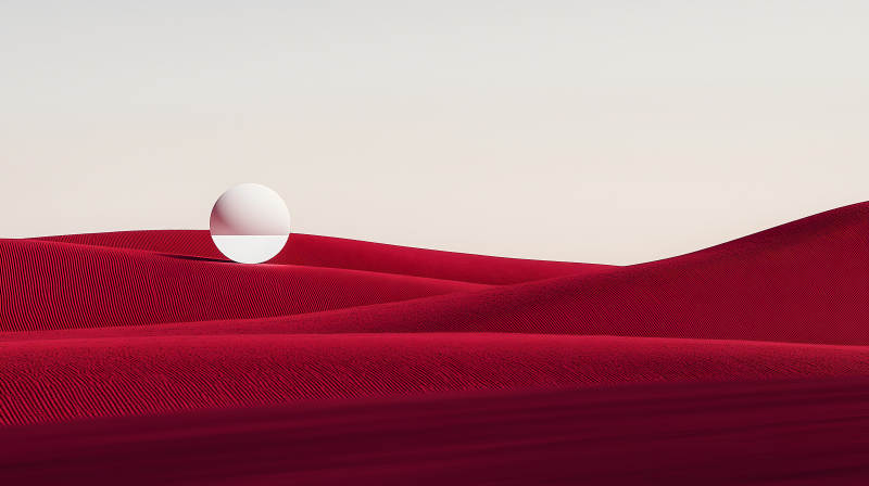 红色沙漠中的超现实球体图片