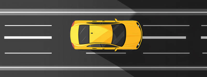 俯瞰高速公路上的黄色汽车图片