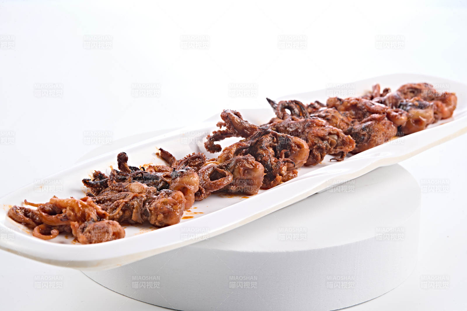 香辣油炸鱿鱼须图片