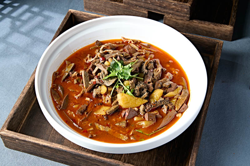 红油香辣土豆顿羊杂图片