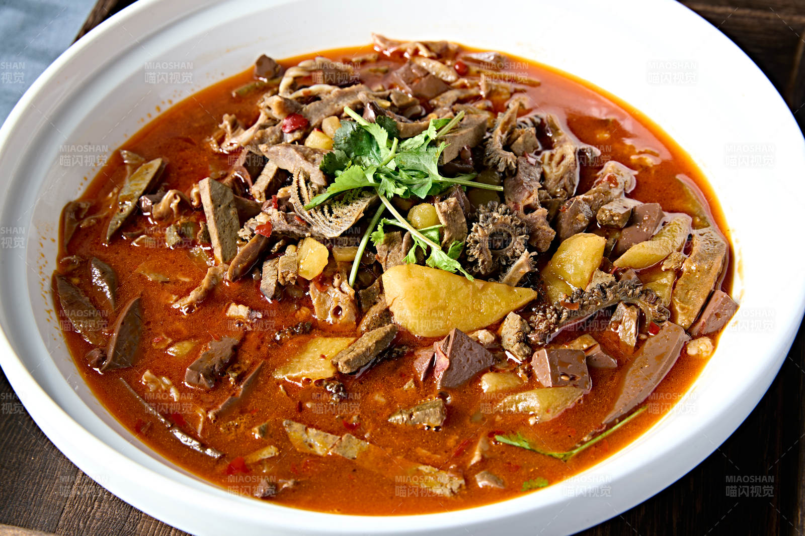 红油香辣土豆顿羊杂图片