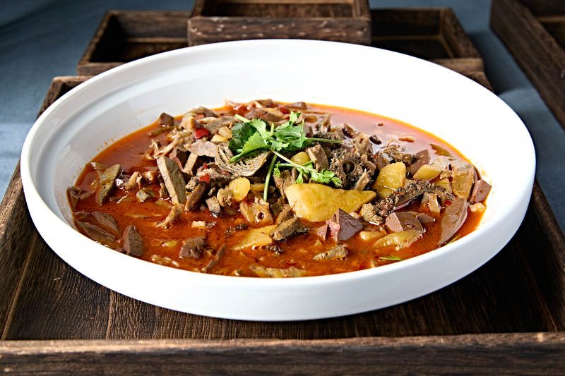 红油香辣土豆顿羊杂图片