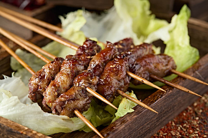 美味烧烤炭烤裹油羊肝图片