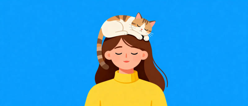 猫卧头顶的女孩图片