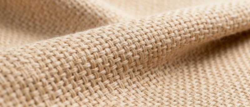 米色织物纹理特写图片