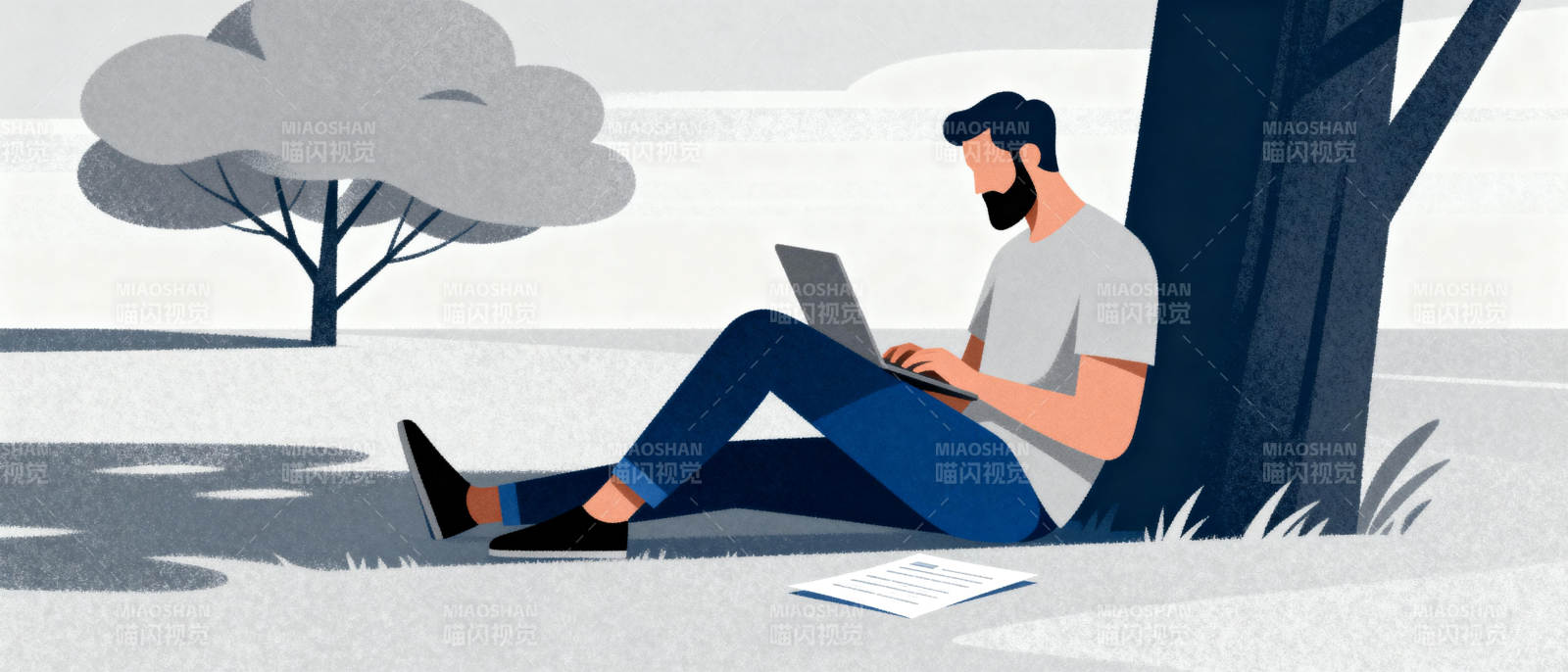 树下办公的男子图片