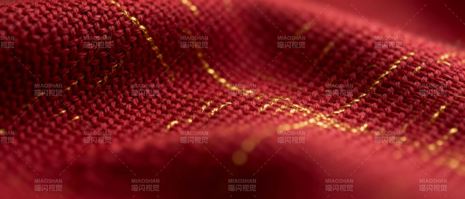 红金织纹布料特写图片