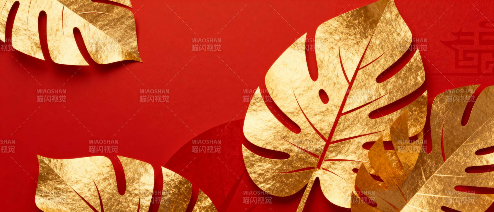 金色叶片红背景图片