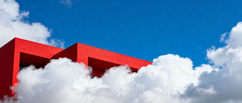 红建筑与白云图片