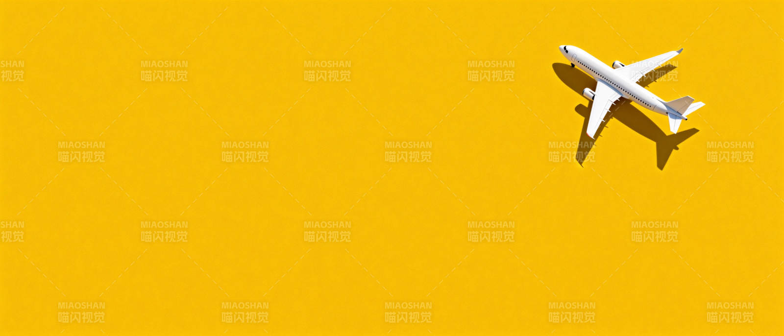 飞机飞越黄色背景图片