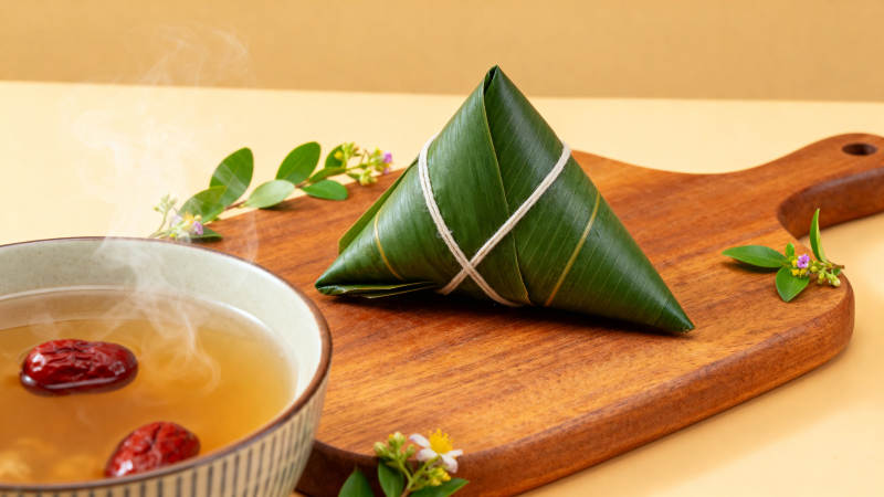 端午节粽子与红枣汤图片