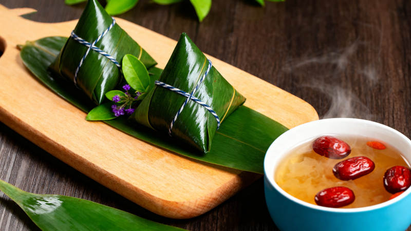 端午节粽子与红枣汤图片