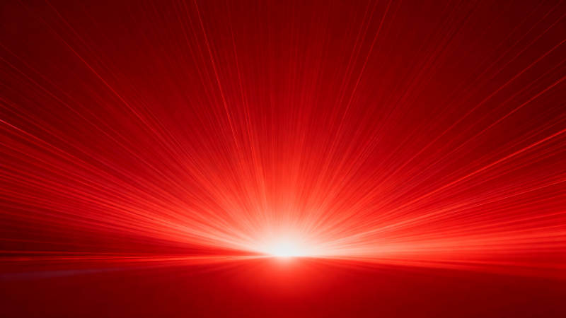 红色光束辐射背景图片