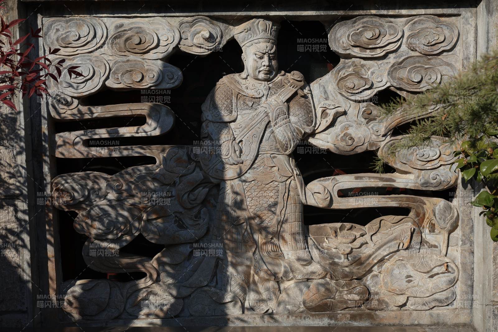 石雕人物云纹图图片