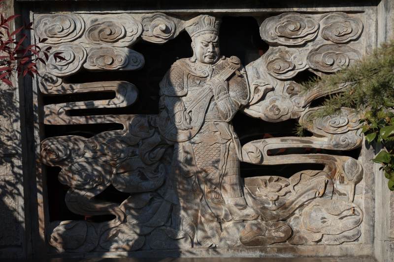 石雕人物云纹图图片