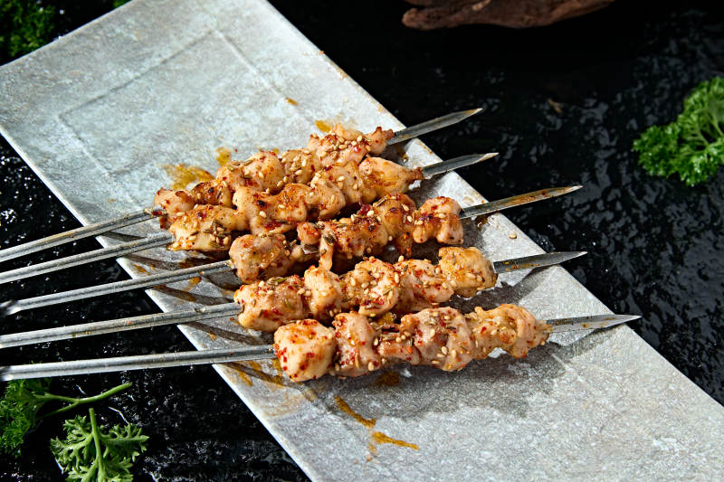 风味美食夜宵烧烤炭烤美味羊肉筋图片