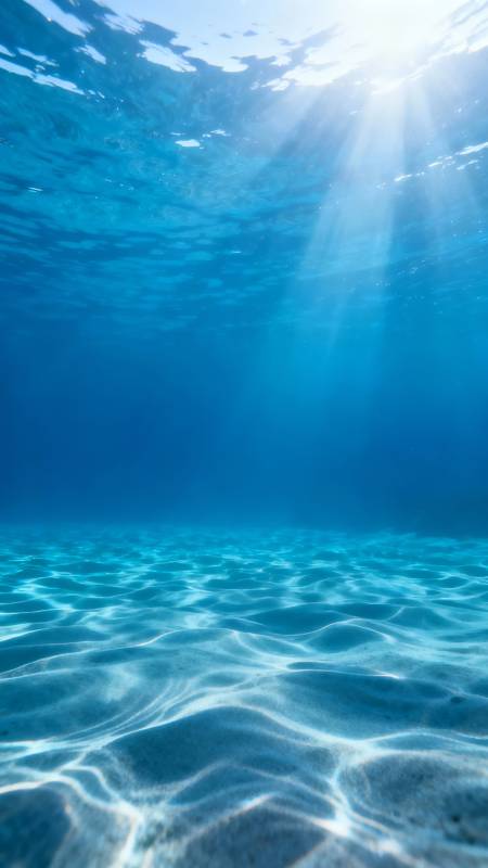 海底阳光穿透水波图片