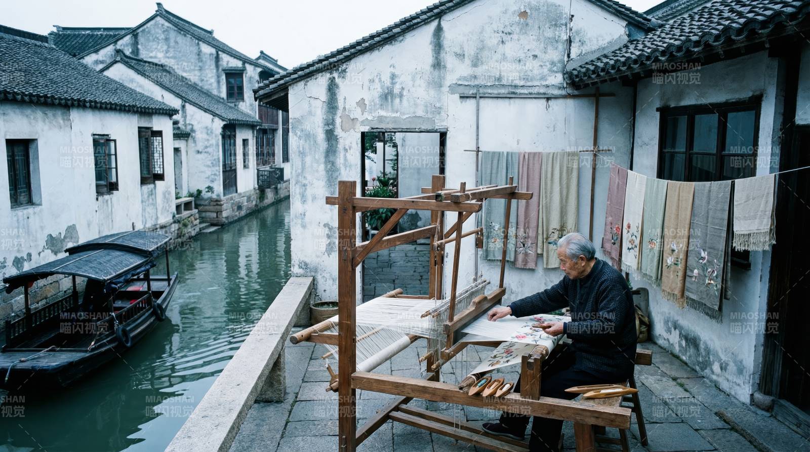 水乡织布人图片