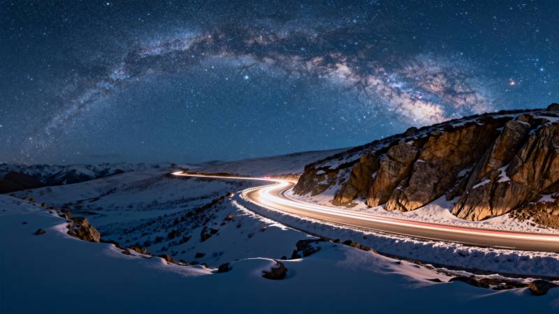星河雪路夜景图片